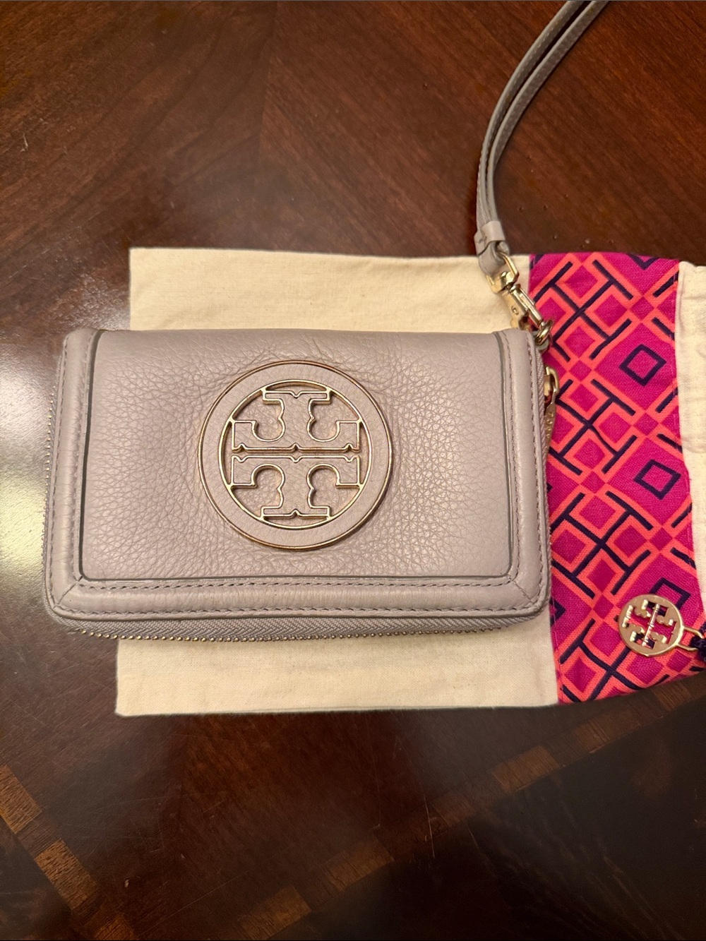 Tory Burch Light Gray Pebbled Leather Wristlet with Gold Logo